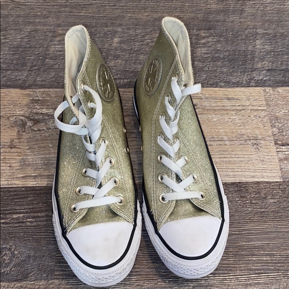 Gold Sparkly Converse High Tops.